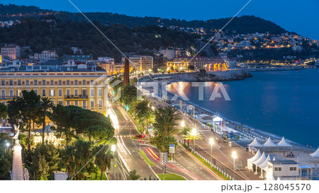 Evening aerial panorama of Nice day to night timelapse, France. Lighted Old Town little streets and waterfront after sunset Evening aerial panorama of Nice day to night timelapse, France. Lighted Old Town little streets and waterfront after sunset 128045570