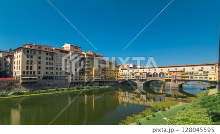 The Ponte Vecchio on a sunny day timelapse hyperlapse, a medieval stone segmental arch bridge over the Arno River, in Florence, Italy The Ponte Vecchio on a sunny day timelapse hyperlapse, a medieval stone segmental arch bridge over the Arno River, in Florence, Italy 128045595