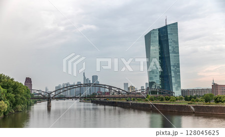 Hyperlapse of Frankfurt skyline featuring the modern ECB headquarters skyscraper. Frankfurt am Main, Germany Hyperlapse of Frankfurt skyline featuring the modern ECB headquarters skyscraper. Frankfurt am Main, Germany 128045625