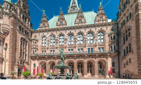 Hyperlapse of Hamburg City Hall with Hygieia Fountain in the courtyard near market square and Binnenalster, Germany 128045655