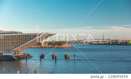 Aerial timelapse of Dockland Hamburg Altona at the old fishing port, now featuring modern office buildings on the Elbe River. Aerial timelapse of Dockland Hamburg Altona at the old fishing port, now featuring modern office buildings on the Elbe River. 128045659