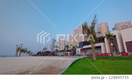 People on the Jumeirah Beach in Dubai, UAE. Timelapse People on the Jumeirah Beach in Dubai, UAE. Timelapse 128045733