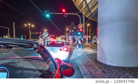 Car moves at fast speed at the night streets timelapse hyperlapse drivelapse. 128045790