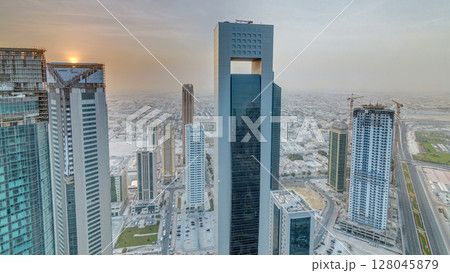 Skyscrapers at sunset timelapse in the skyline of commercial center of Doha, the capital Qatar 128045879