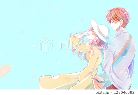 隣り合って幸せそうに笑う男女　外出　桜吹雪 128046392