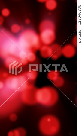Abstract red bokeh background with soft round glowing light circles against a black backdrop Abstract red bokeh background with soft round glowing light circles against a black backdrop 128046839