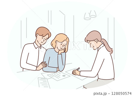Married couple is consulting insurance agent or lawyer and drawing up marriage contract in office 128050574