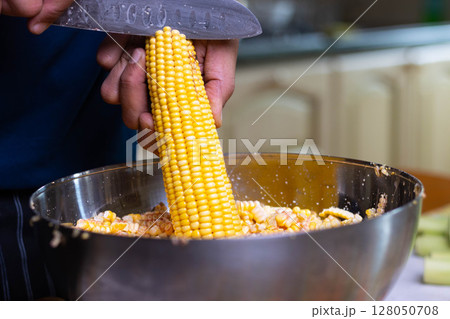 Artisanal preparation of corn cachapas, a typical Venezuelan dish. 128050708