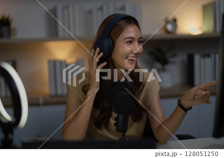 Engaging Live Streamer Smiling in Home Office 128051250