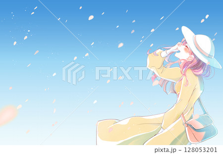 幸せそうに笑う女性　お出かけ　桜吹雪　横長 128053201