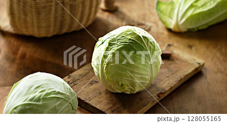Fresh green cabbage on a rustic wooden table Fresh green cabbage on a rustic wooden table 128055165