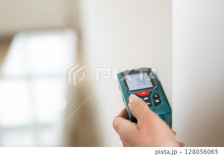 Laser Distance Meter Tool Provides Room Measurements Laser Distance Meter Tool Provides Room Measurements 128056065