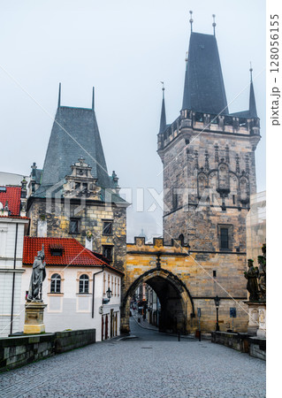 Mysterious Charles Bridge In Prague With Mala Strana Bridge Tower Through A Light Fog Mysterious Charles Bridge In Prague With Mala Strana Bridge Tower Through A Light Fog 128056155