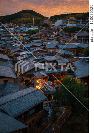 Vibrant Sunset Over Dukezong Ancient Town in Shangri-La, China Vibrant Sunset Over Dukezong Ancient Town in Shangri-La, China 128056529