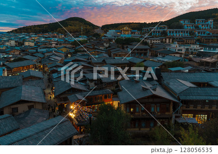 Vibrant Sunset Over Dukezong Ancient Town in Shangri-La, China Vibrant Sunset Over Dukezong Ancient Town in Shangri-La, China 128056535