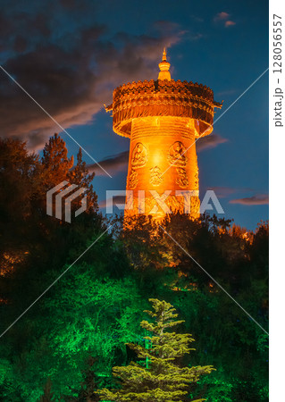 Illuminated Prayer Wheel of Dafo Temple in Shangri-La at Twilight Illuminated Prayer Wheel of Dafo Temple in Shangri-La at Twilight 128056557