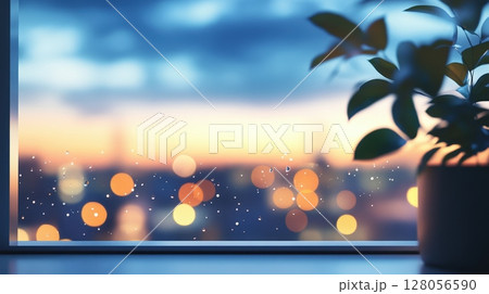 Water droplets on window with view of blurred evening city Water droplets on window with view of blurred evening city 128056590