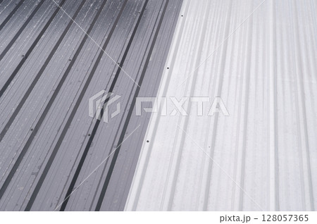 Corrugated metal sheet cladding common building material provides strong protection and insulation similar to rigid pu foam panels often installed behind weatherproof surface Corrugated metal sheet cladding common building material provides strong protection and insulation similar to rigid pu foam panels often installed behind weatherproof surface 128057365