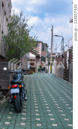 Motorcycle on a Paved Alley in Bukchon Hanok Village, Seoul. 128057493