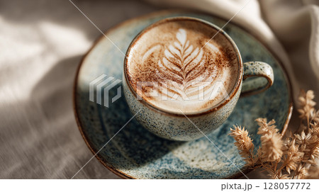 beautiful coffee art cappuccino with hard shadows in ceramic cup 128057772