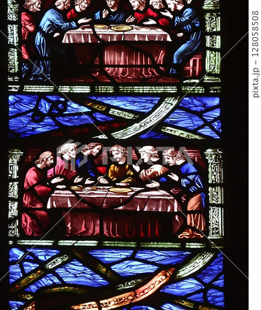 The stained glass window depicts the Last Supper, with Jesus 128058508