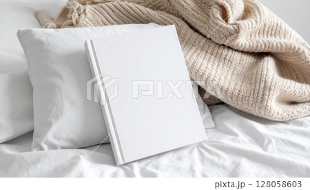 White Book Mockup on Cozy Bed with Cream Blanket 128058603