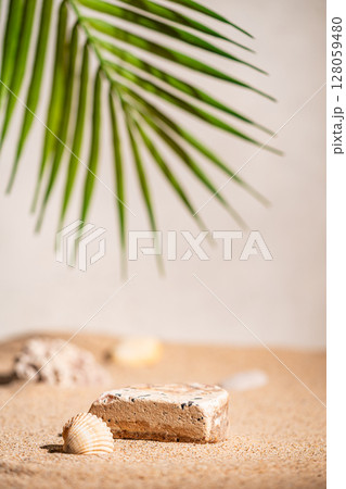 Stone Podium On Sand Stone Podium On Sand 128059480