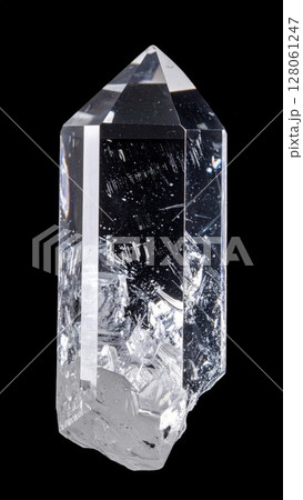 Clear Quartz Crystal Point on Black Background Clear Quartz Crystal Point on Black Background 128061247