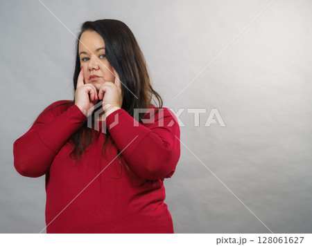 Unhappy sad big woman 128061627