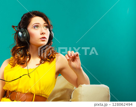 girl in headphones listening music mp3 relaxing girl in headphones listening music mp3 relaxing 128062494