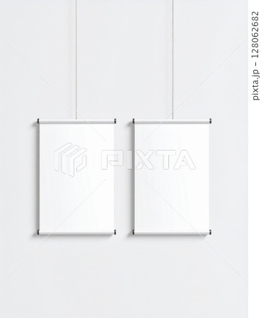 Two Blank White Posters on a White Wall Mockup 128062682