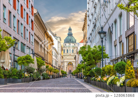 Saint Stephen Basilica view from a walking street in the downtown of Budapest, famous landmark of Hungary Saint Stephen Basilica view from a walking street in the downtown of Budapest, famous landmark of Hungary 128063868