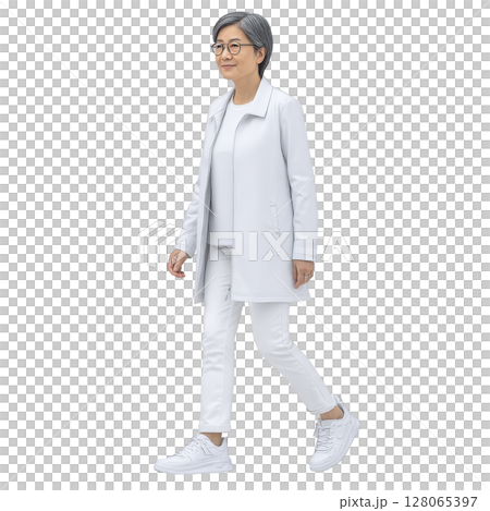 Woman with short gray hair, wearing glasses, walks confidently in stylish white outfit, including coat, pants, and sneakers. She exudes sense of calm and elegance 128065397