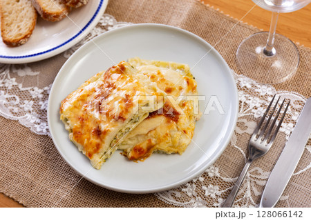 Italian casserole made from filo dough, lightly salted salmon and broccoli cabbage 128066142