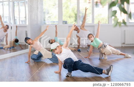Group of children dancers having break dance training at dance studio 128066793