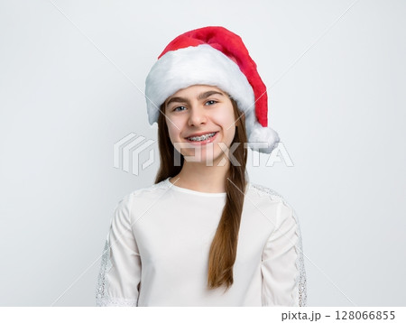 Girl Santa hat showing joy, delight, surprise, approval. Happy emotions, joy Christmas concept. 128066855