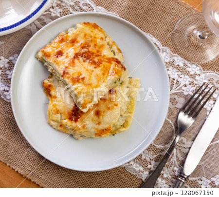 Italian casserole made from filo dough, lightly salted salmon and broccoli cabbage 128067150