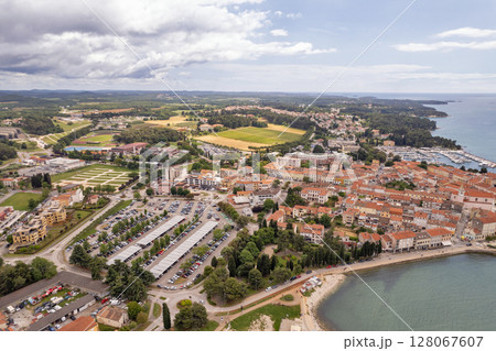 Aerial drone view of Porec coast and town in Croatia. 128067607