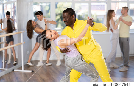 Adult man and woman dancing latin dances Adult man and woman dancing latin dances 128067646
