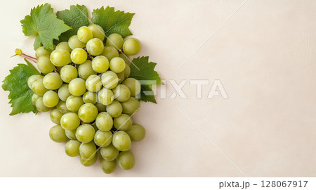 Bunch ripe green grapes simple uniform background, grape, harvest. Concept purchase, sale, banner 128067917