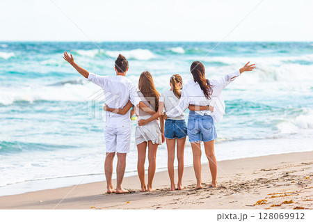 Young family on vacation have a lot of fun Young family on vacation have a lot of fun 128069912