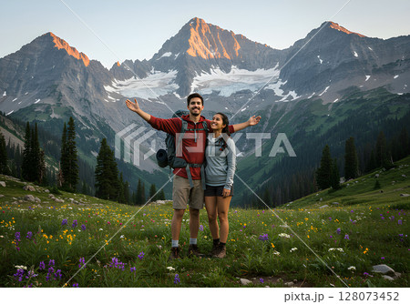 Man and woman posing on a mountain 128073452