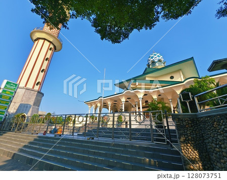 Kediri, East Java Indonesia - July 02 2025: The great mosque of the Kediri city (Masjid Agung Kediri) with clear blue sky background, 128073751