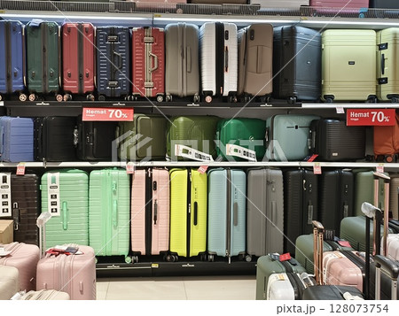 Indonesia,Kediri East Java june, 25 2025-An assortment of suitcases in hard and soft cases on display in a retail store chain 128073754