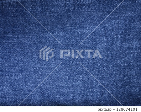 Close-up of blue denim jeans fabric texture background 128074101