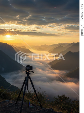 Mountain Valley Sunrise Timelapse with Rolling Fog and Dramatic Sunbeams 128079775
