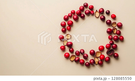 Flat lay circular arrangement of cranberries vegetable fruit for natural ingredient, copy space 128085550