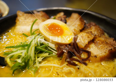 Close-up of Japanese Ramen with Soft-Boiled Egg, Chashu Pork, and Vegetables Close-up of Japanese Ramen with Soft-Boiled Egg, Chashu Pork, and Vegetables 128086033