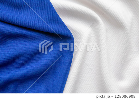 Blue and white sports clothing fabric football shirt jersey texture background 128086909