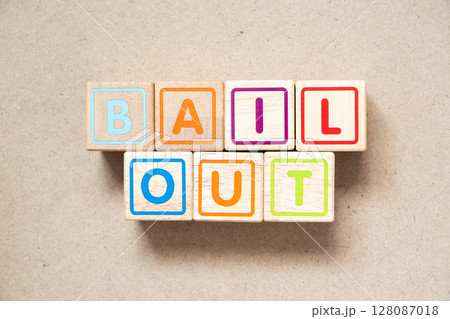 Alphabet letter block in word bail out on wood background 128087018